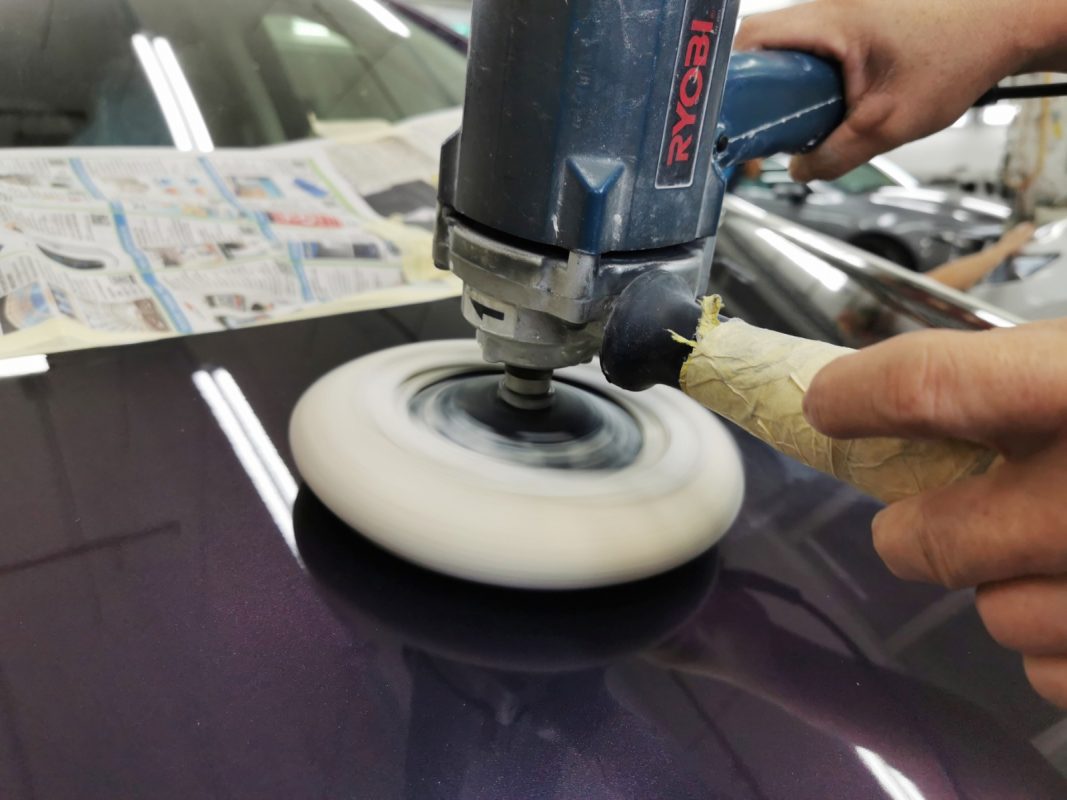 Polishing the new paint on the Odyssey to bring up the shine.