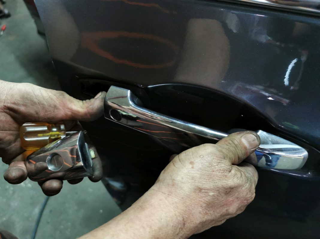 Buffing the new paint on the Odyssey to bring up the shine.