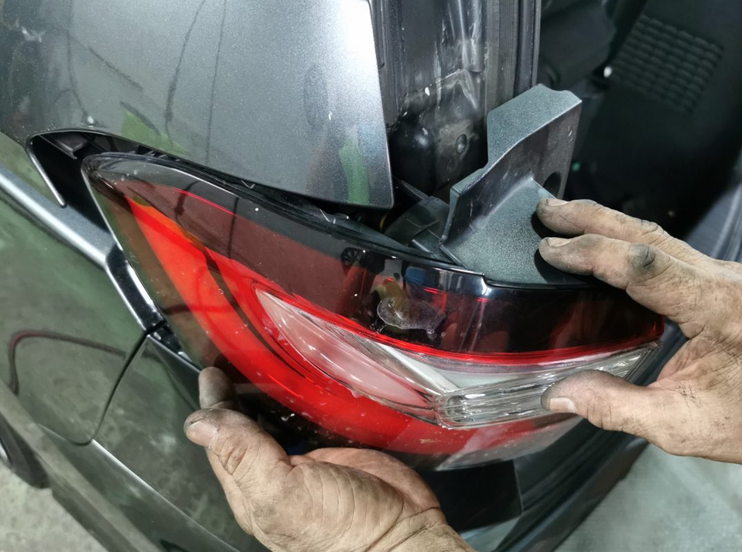 Previously removed car parts being refitted onto the Odyssey.