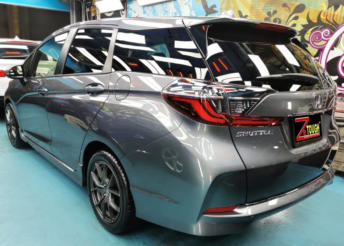 Rear quarter of the Honda Shuttle, glossy and protected.