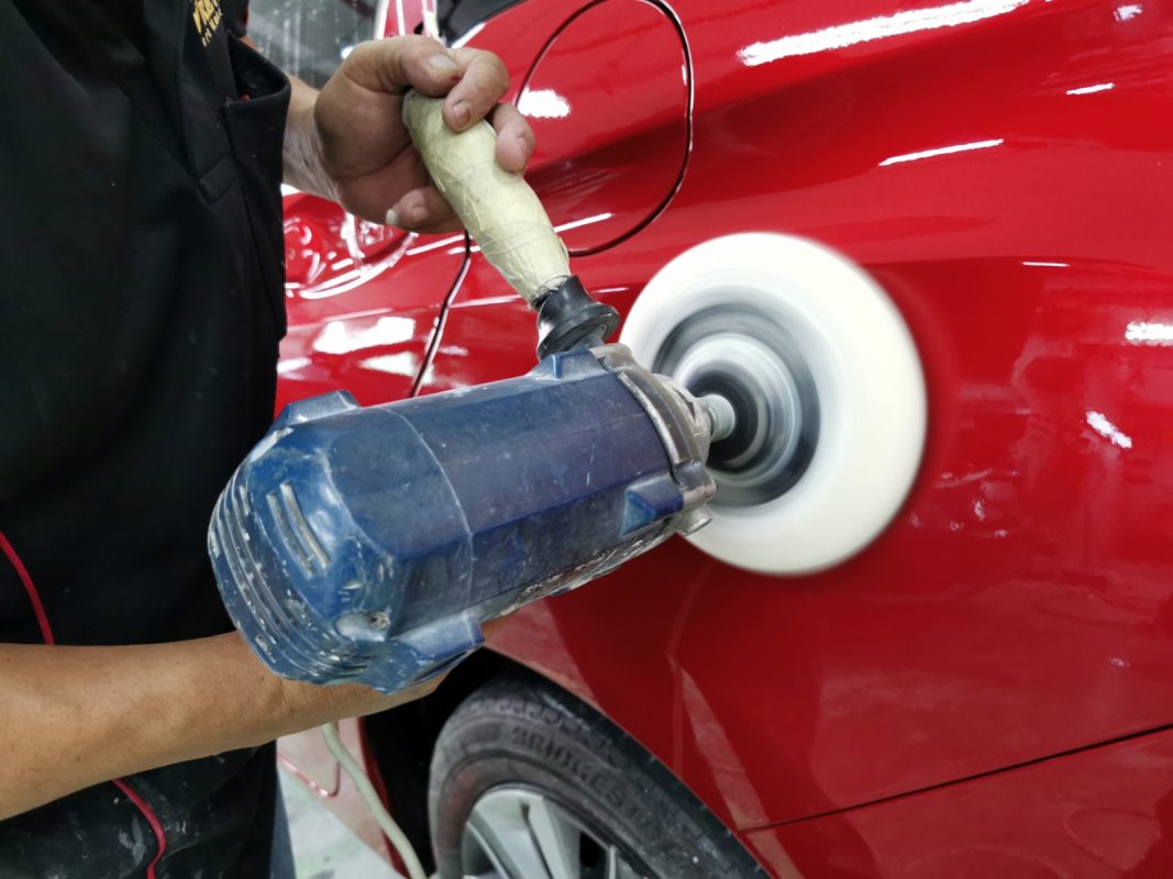 Polishing the new paint on the Shuttle to bring up the shine.