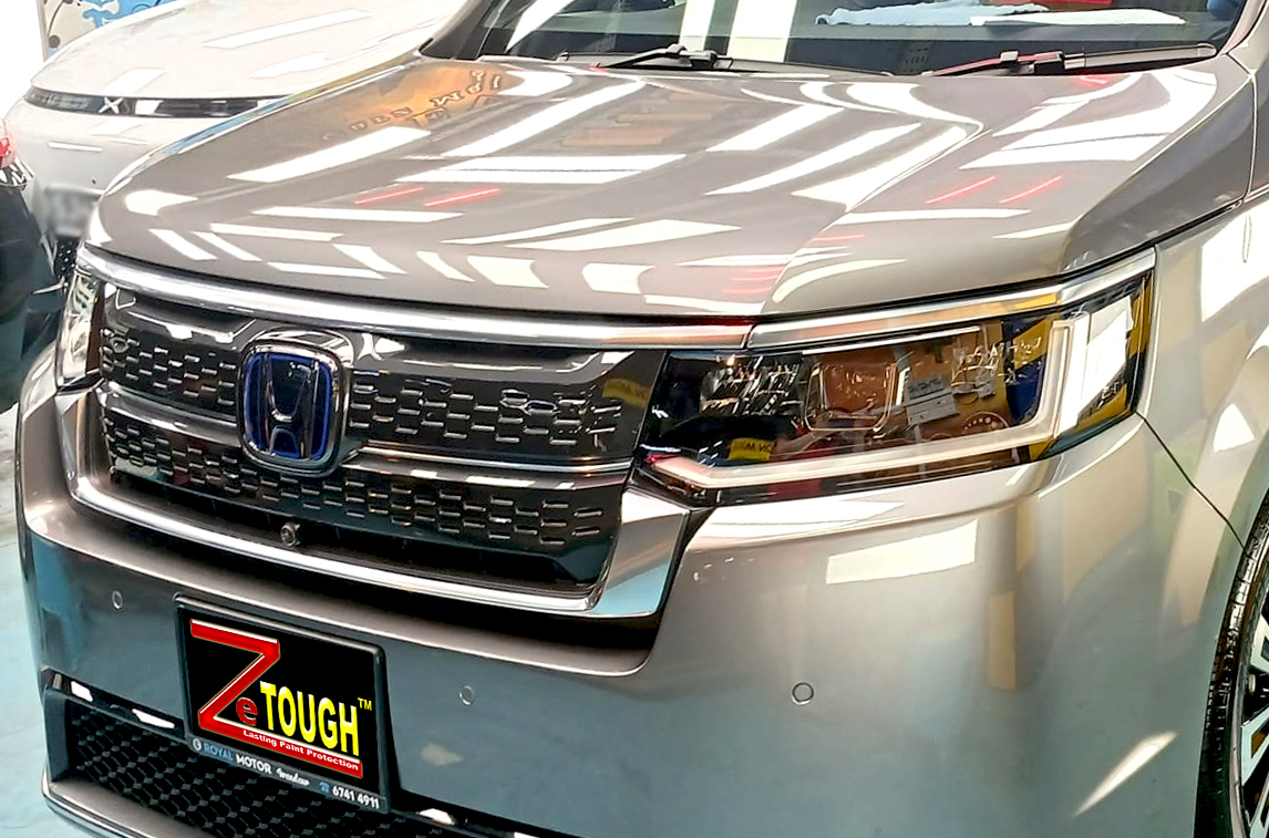 The Honda Stepwagon from a side angle after the ceramic coating.