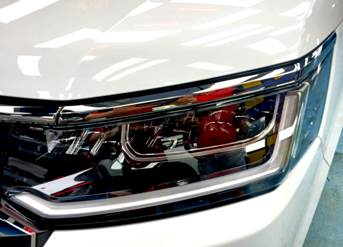 The Stepwagon's coated paintwork showing clean reflections.