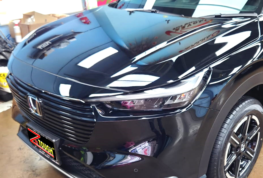 The Honda Vezel from a side angle after the titanium coating.
