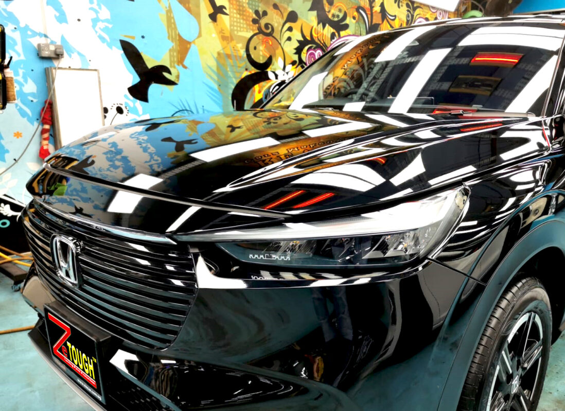 The Honda Vezel from a side angle after the titanium coating.
