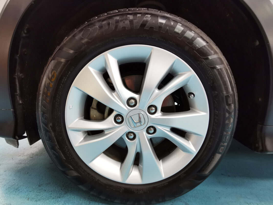 Red Honda Vezel, glossy after its full respray at Revol Carz.