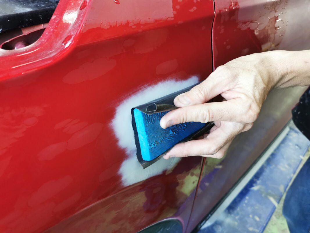 Masking applied to the Honda Vezel before it enters the spray booth.