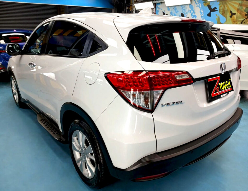 Rear quarter of the Honda Vezel, glossy and protected.