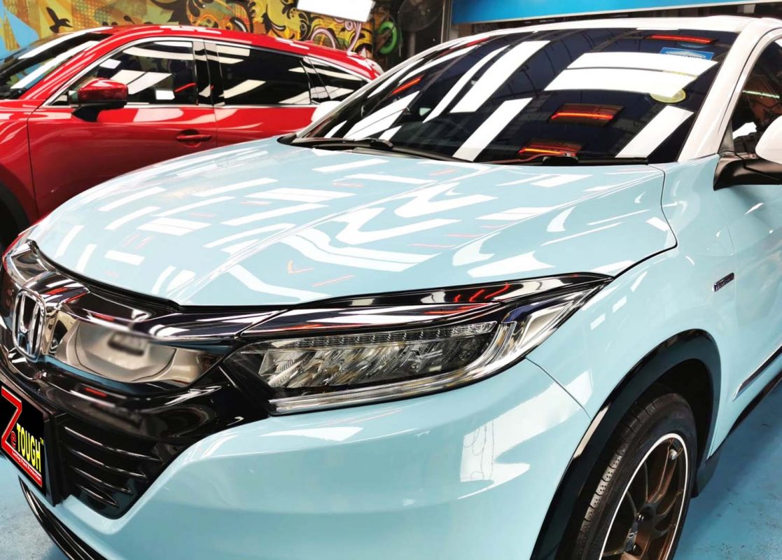 The Honda Vezel from a side angle after the titanium coating.