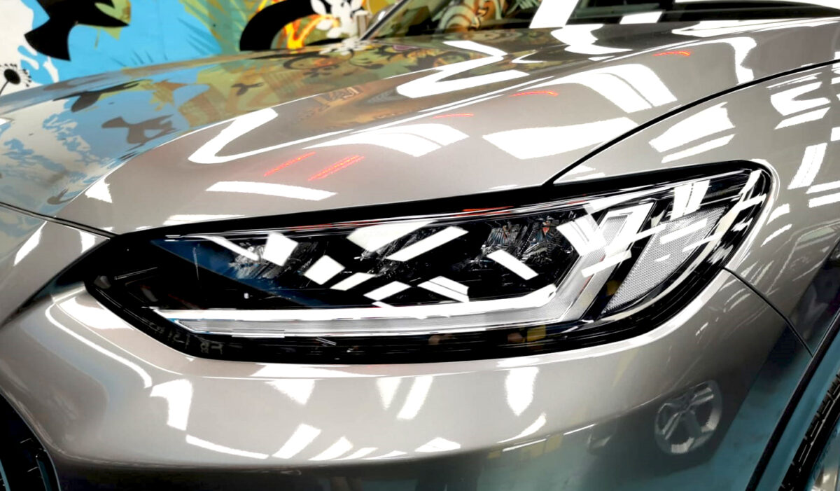 The ZR-V's coated paintwork showing clean reflections.