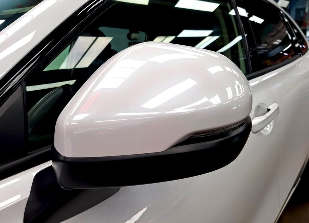 White door mirror on the Honda ZR-V with a glossy finish.