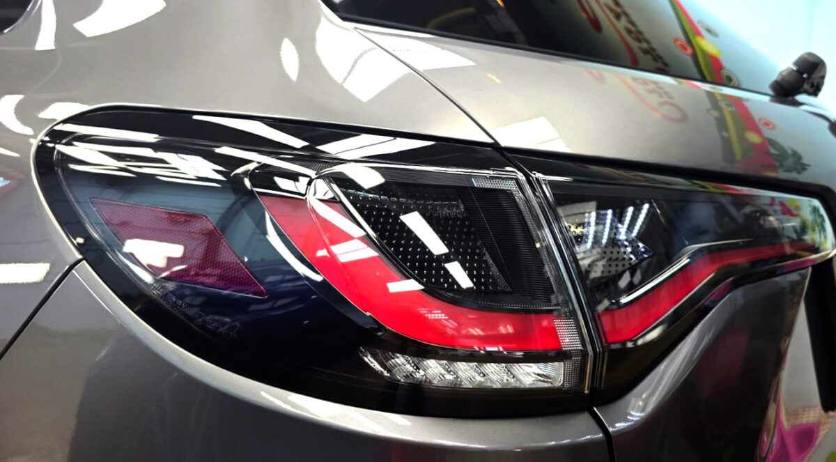The coated bonnet of the Honda ZR-V under workshop lighting.