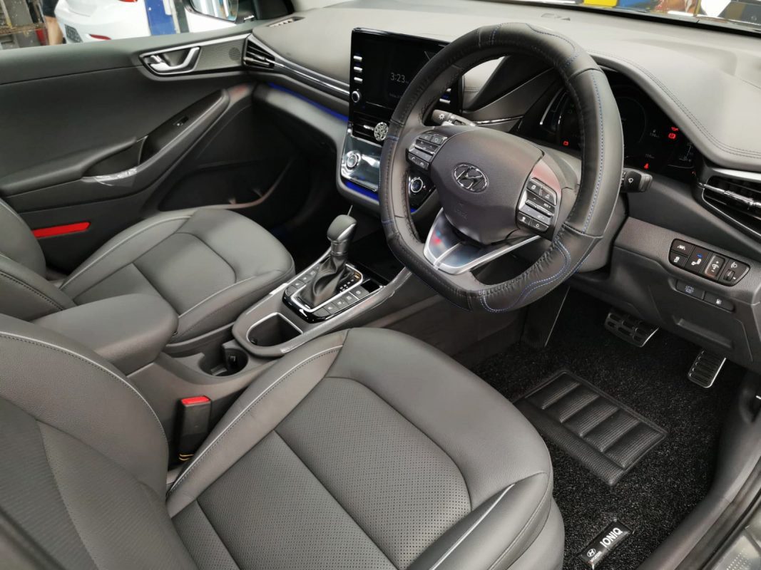 The Hyundai Ioniq parked in the workshop, freshly coated.