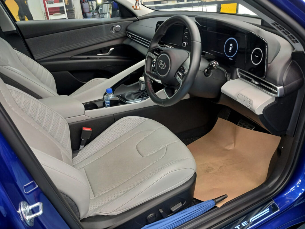 The Hyundai Avante parked in the workshop, freshly coated.