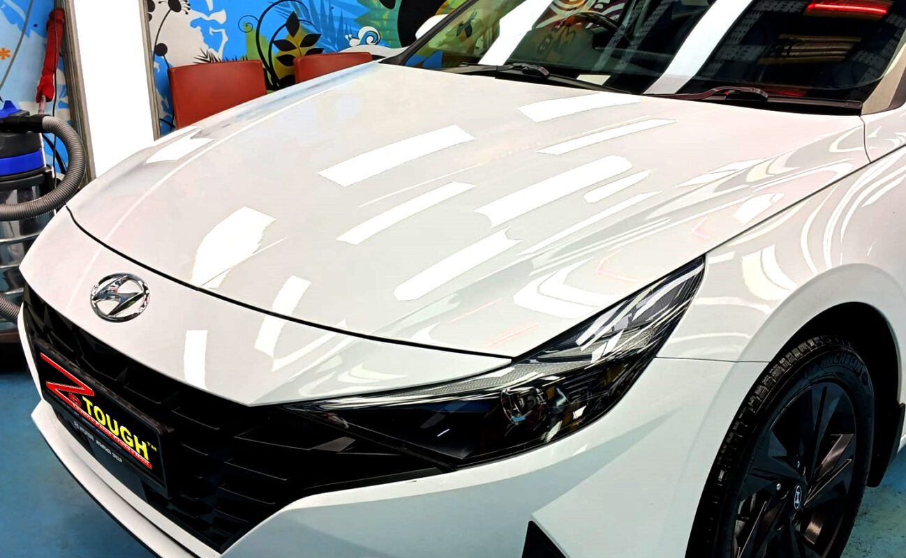 The Hyundai CN7 Avante from a side angle after the titanium coating.