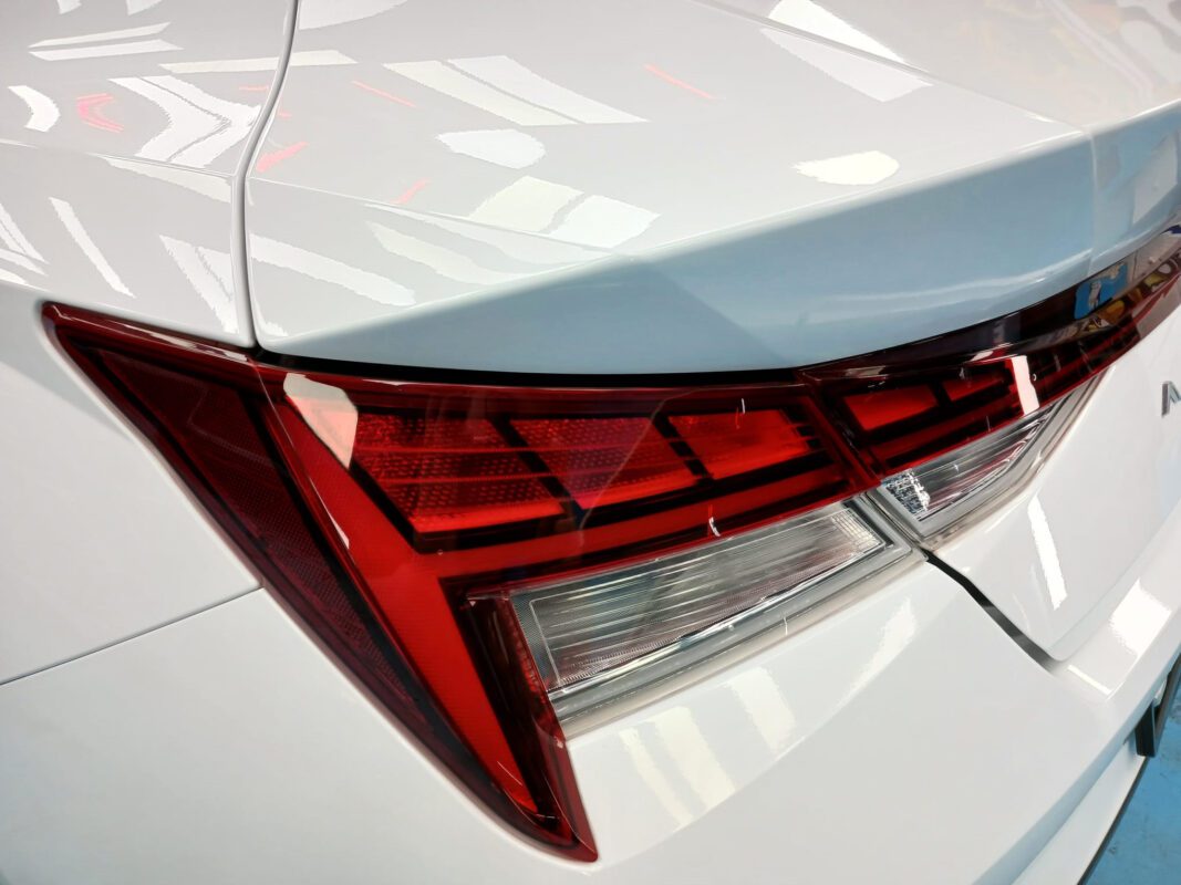 Rear quarter of the Hyundai CN7 Avante, glossy and protected.
