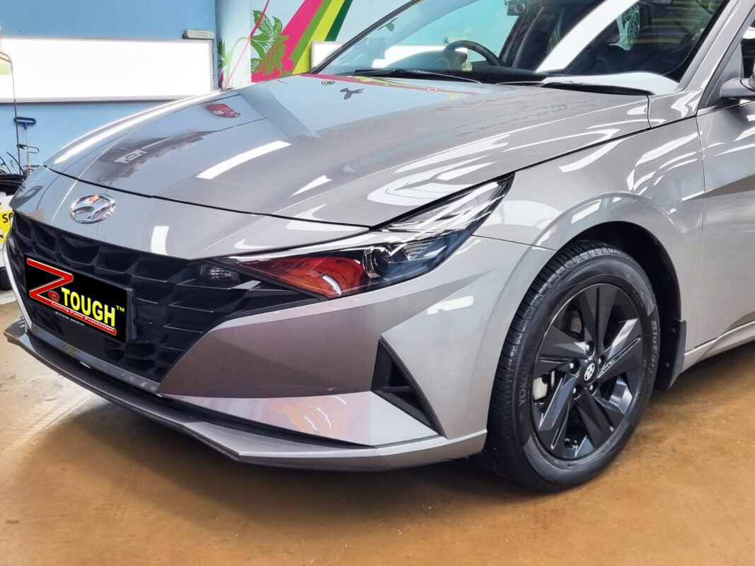 The Hyundai CN7 Avante from a side angle after the titanium coating.