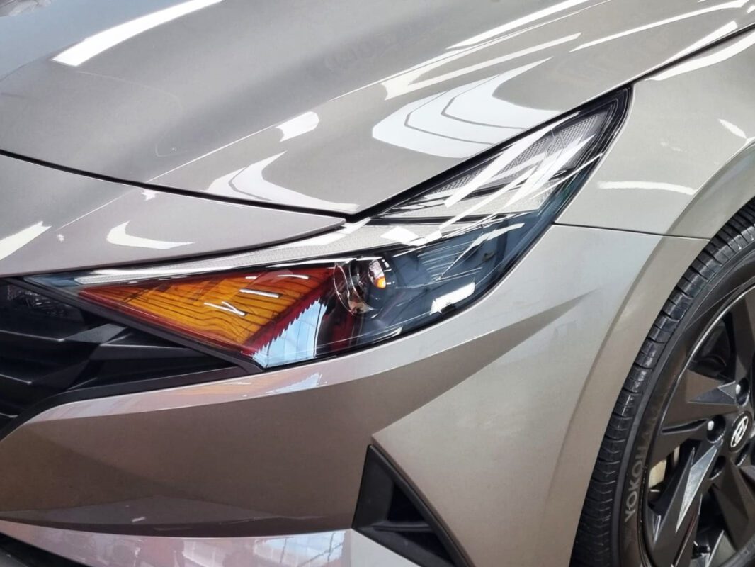 The CN7 Avante's coated paintwork showing clean reflections.