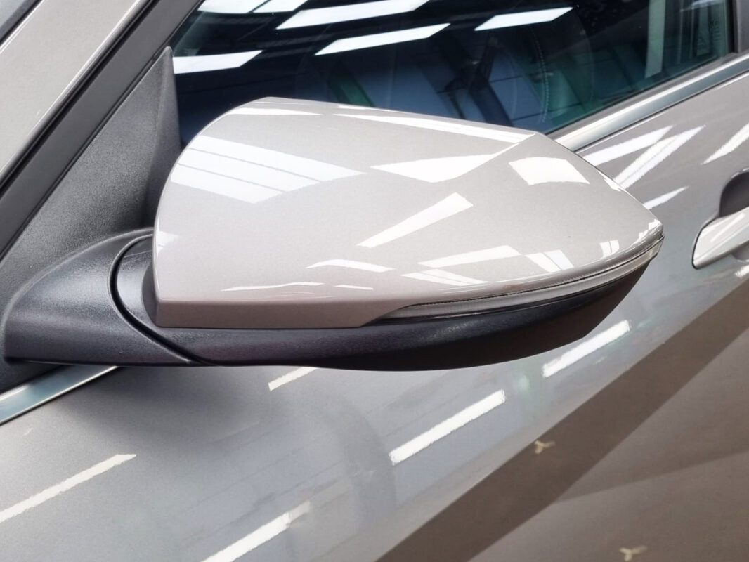 The Hyundai CN7 Avante parked in the workshop, freshly coated.
