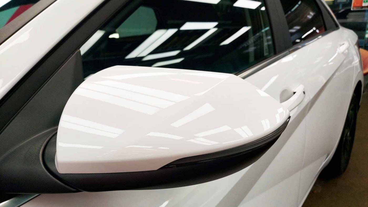 Side panel of the Hyundai CN7 Avante with the ceramic finish locked in.