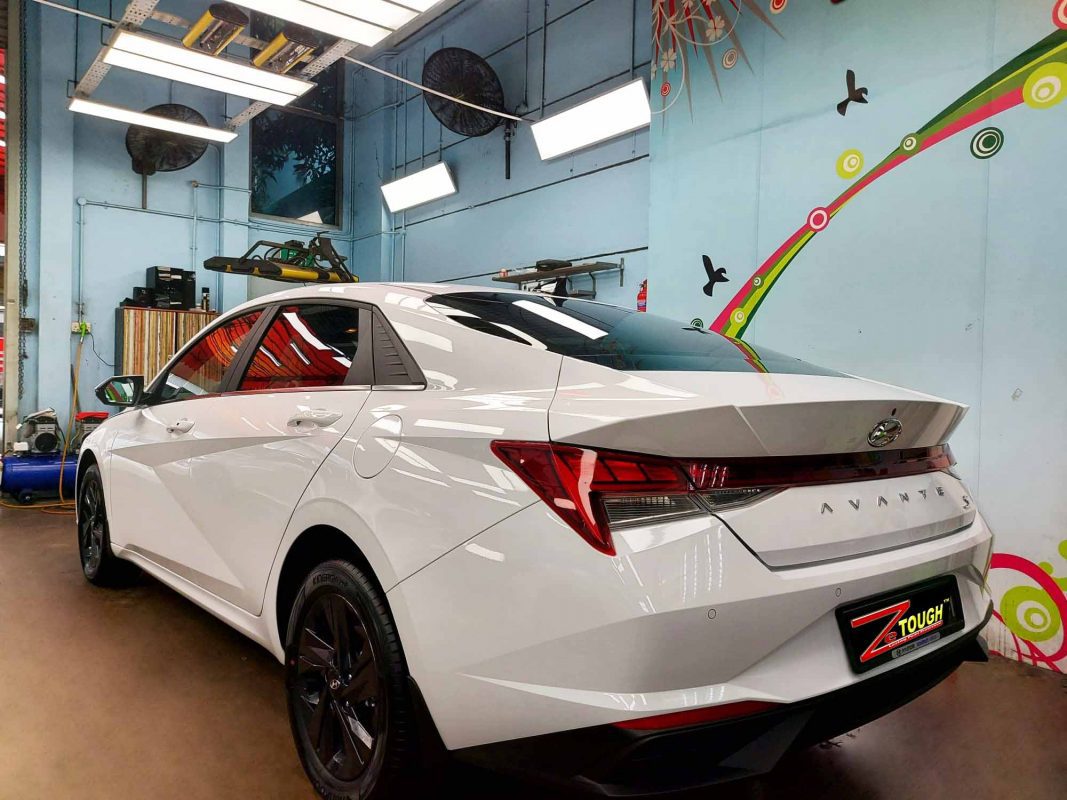 Rear quarter of the Hyundai CN7 Avante, glossy and protected.
