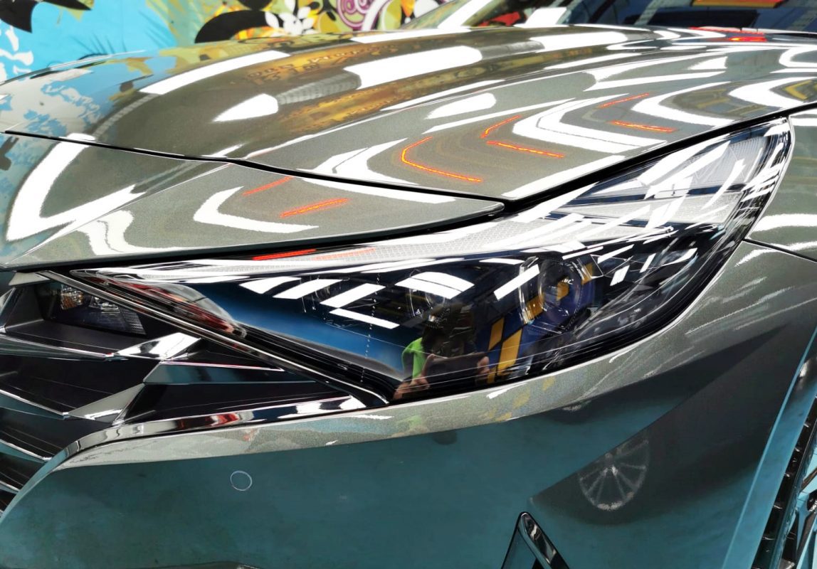 The CN7 Avante's coated paintwork showing clean reflections.