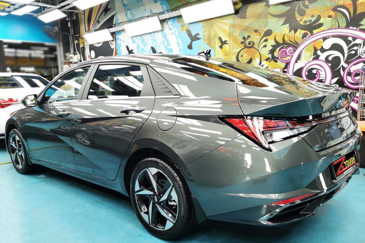 Rear quarter of the Hyundai CN7 Avante, glossy and protected.