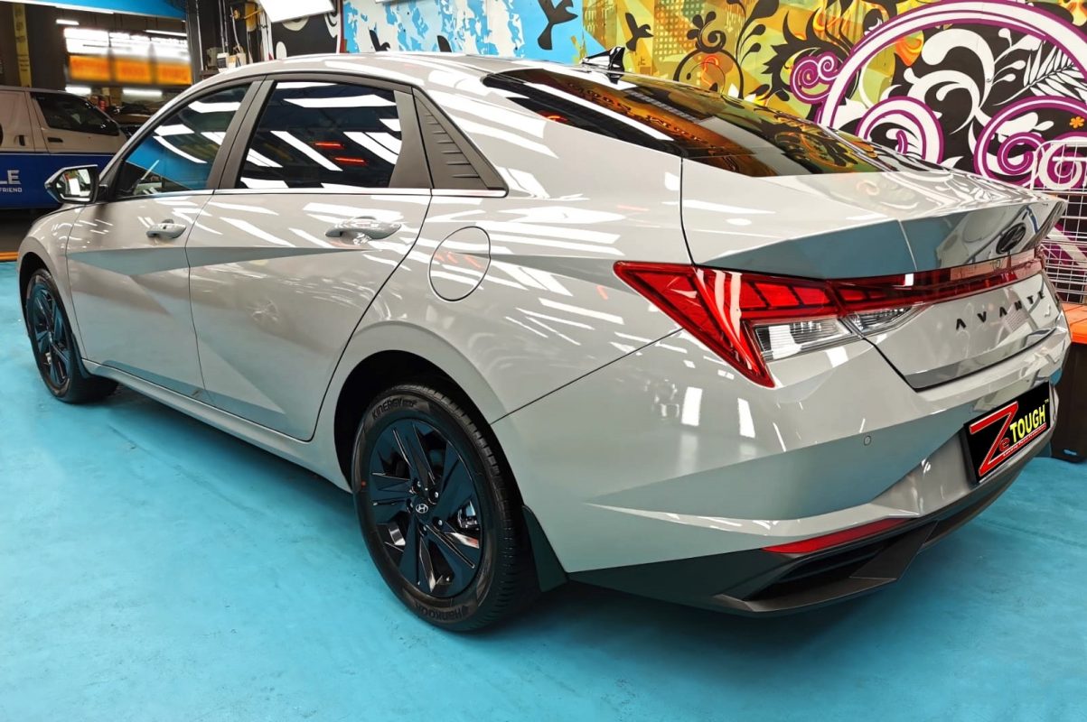 Rear quarter of the Hyundai CN7 Avante, glossy and protected.