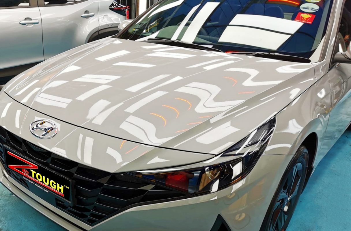 The Hyundai CN7 Avante from a side angle after the titanium coating.