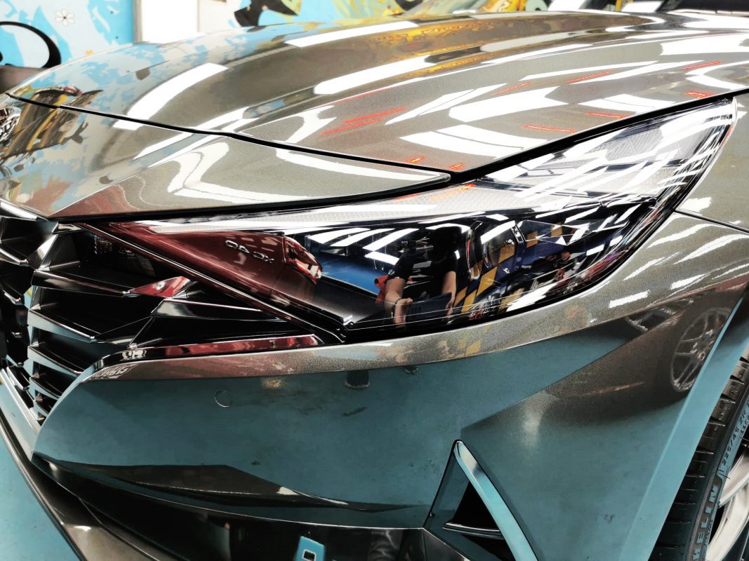 The CN7's coated paintwork showing clean reflections.
