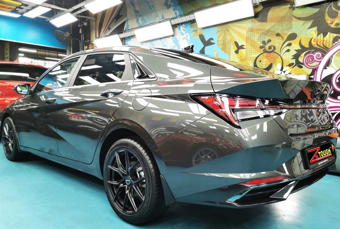 Rear quarter of the Hyundai CN7, glossy and protected.