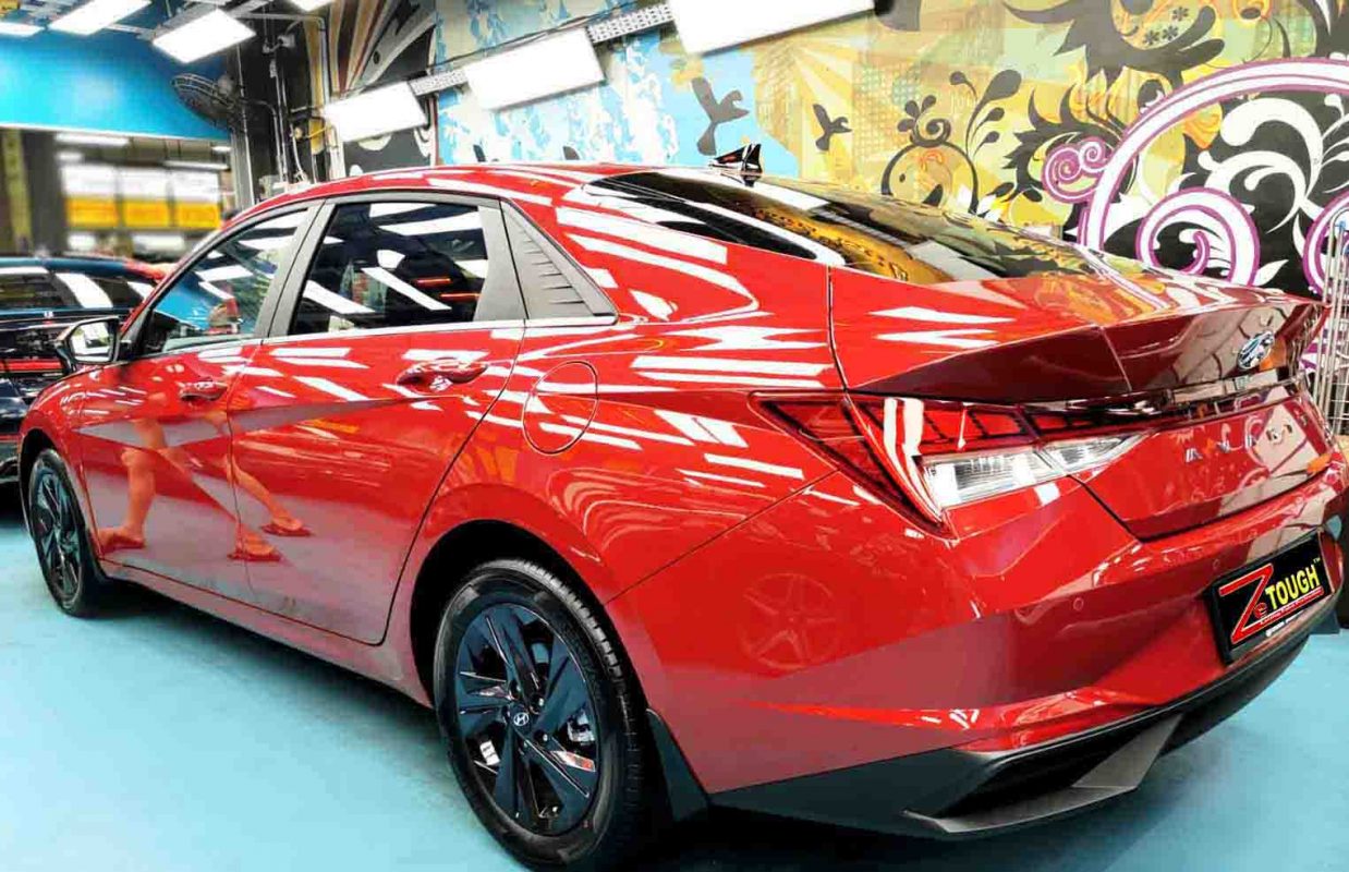 Rear quarter of the Hyundai CN7, glossy and protected.