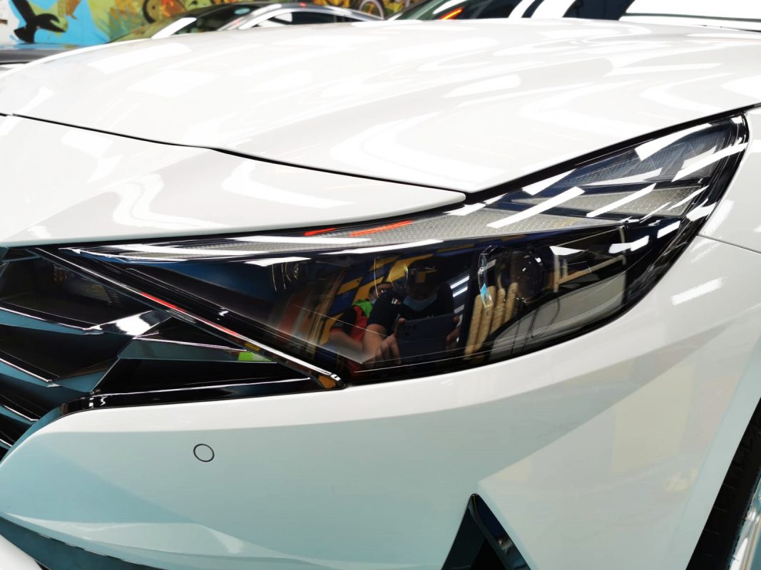 The CN7's coated paintwork showing clean reflections.
