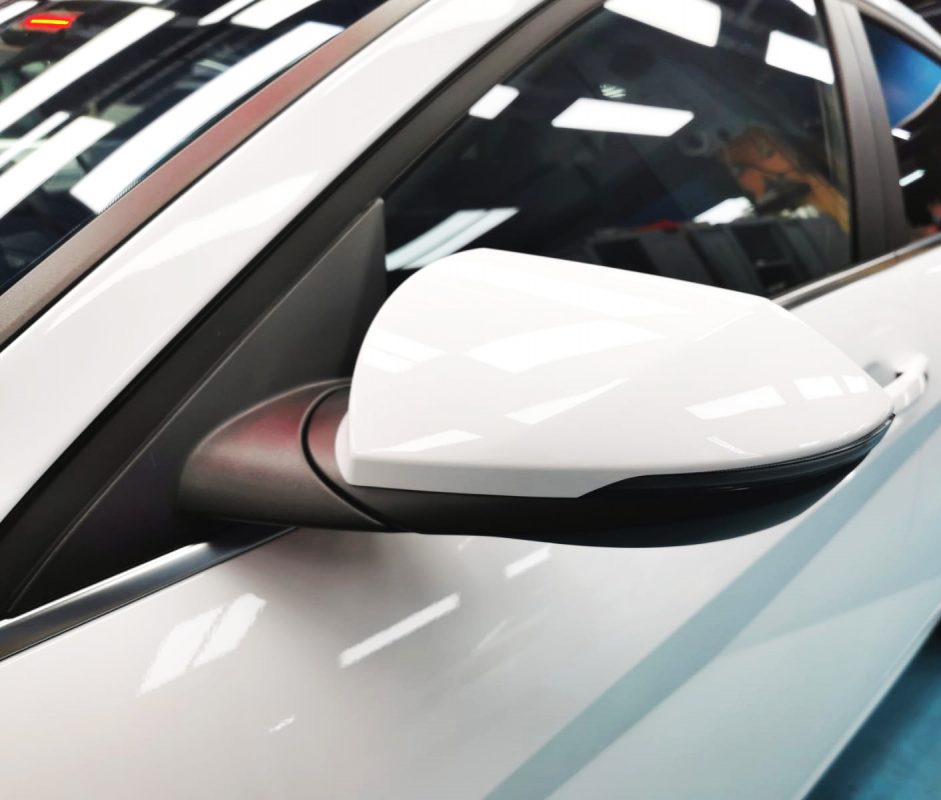 Side panel of the Hyundai CN7 with the titanium finish locked in.