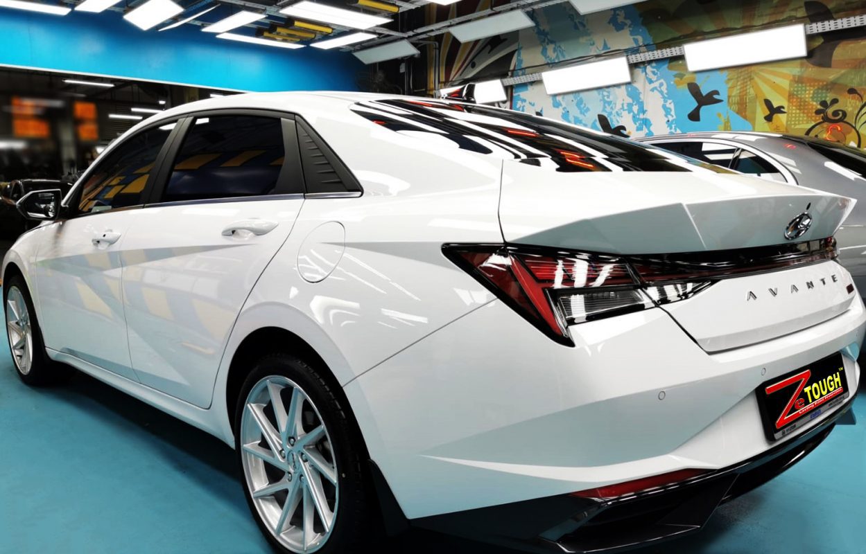 Rear quarter of the Hyundai CN7, glossy and protected.