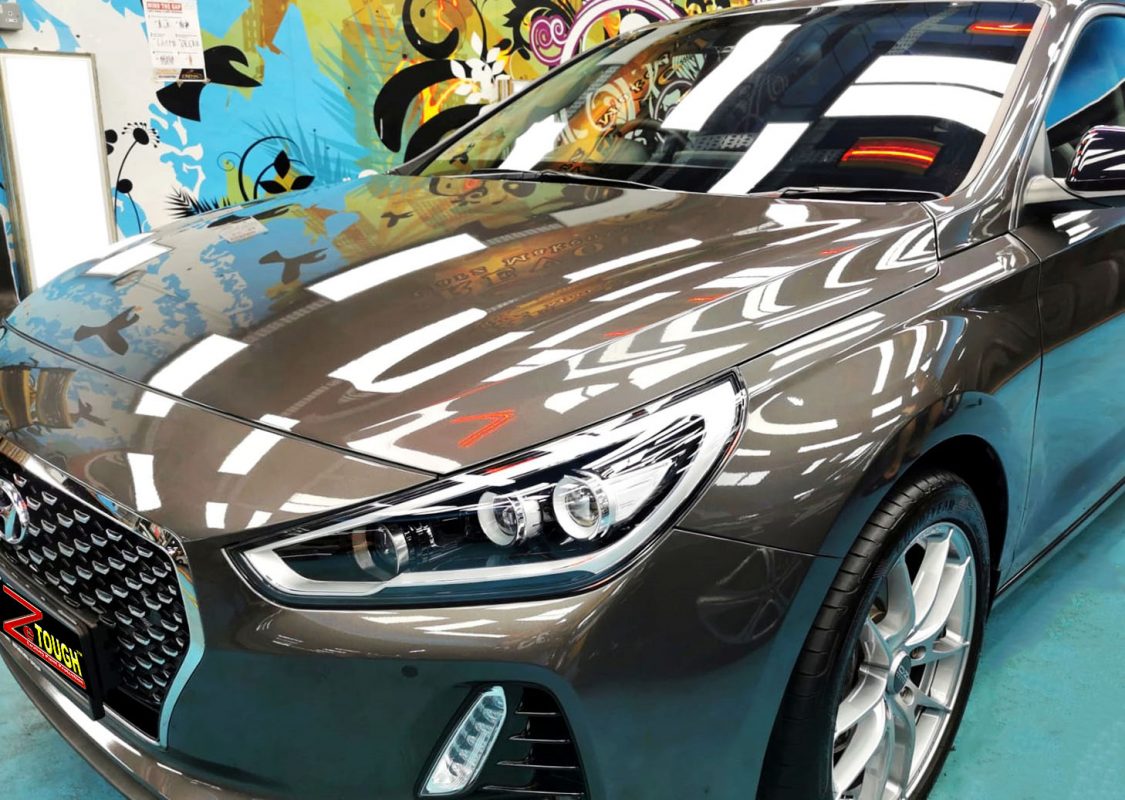 The Hyundai i30 from a side angle after the ceramic coating.