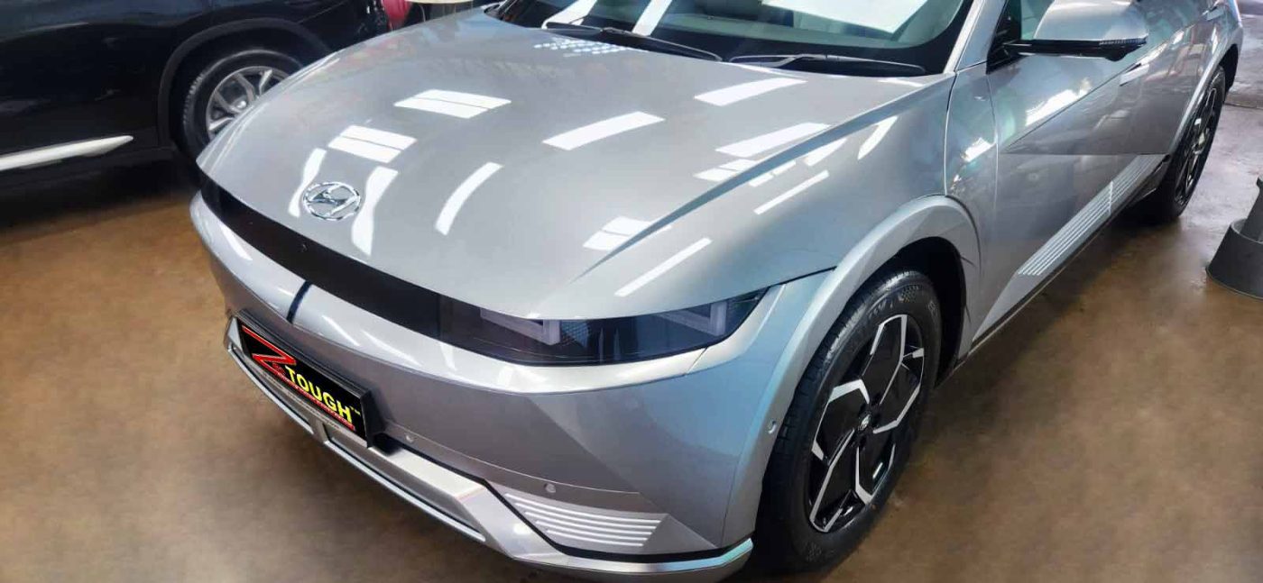 The Hyundai Ioniq 5 from a side angle after the ceramic coating.