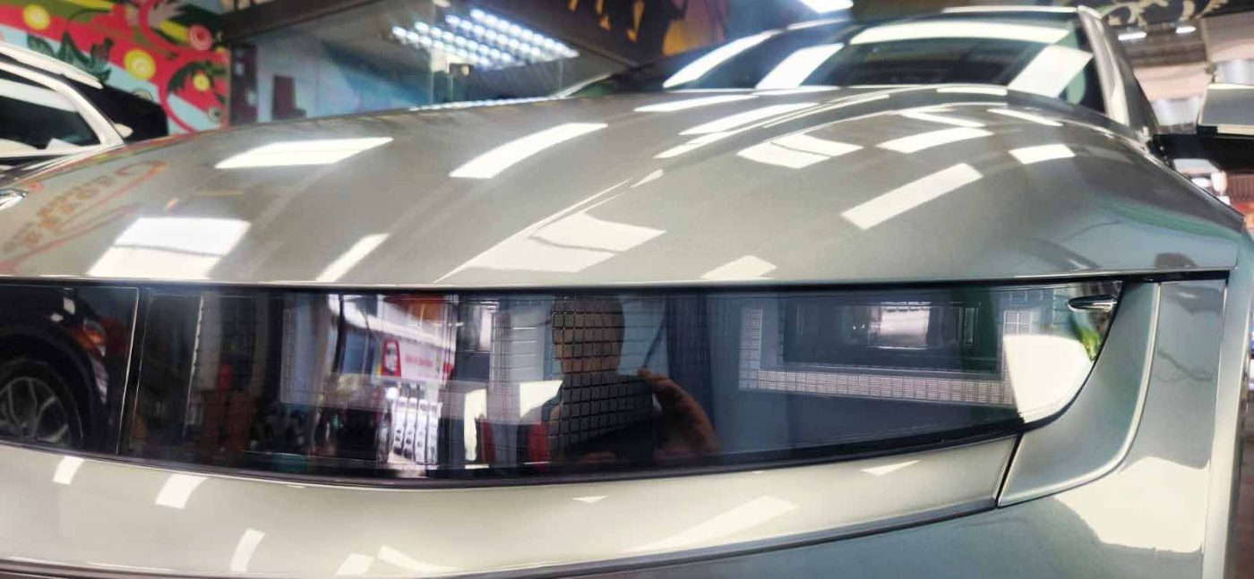 The Ioniq 5's coated paintwork showing clean reflections.