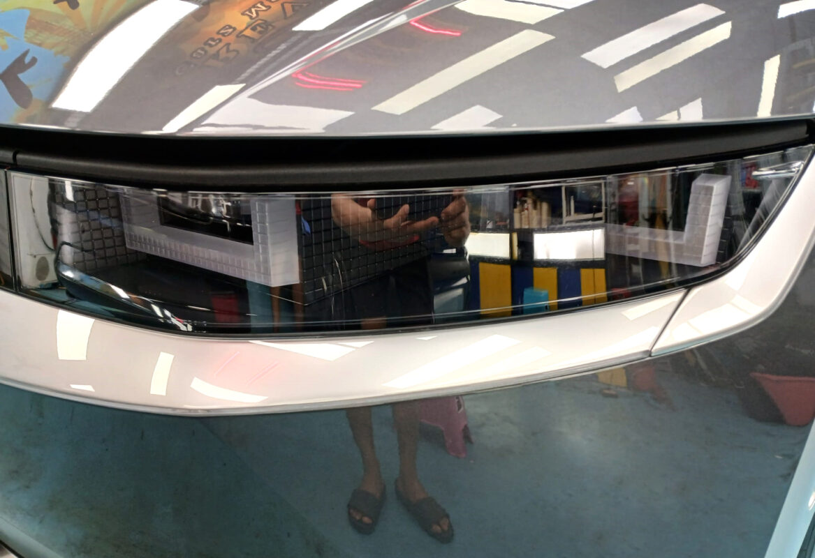 The Ioniq 5's coated paintwork showing clean reflections.