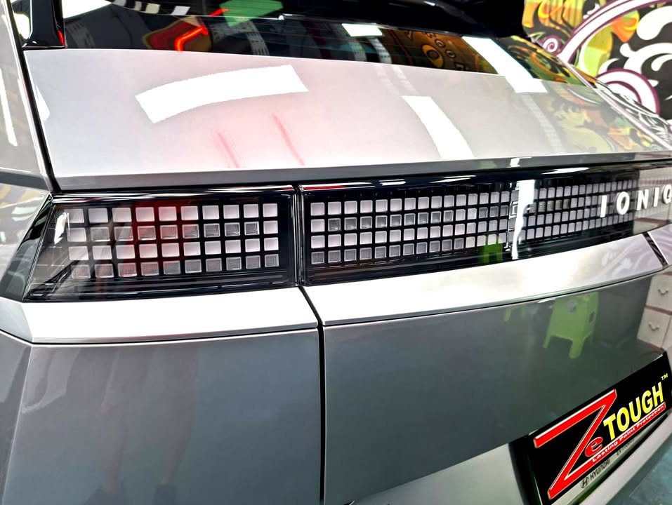 Close-up of the pixel tail light bar and IONIQ lettering on the tailgate.