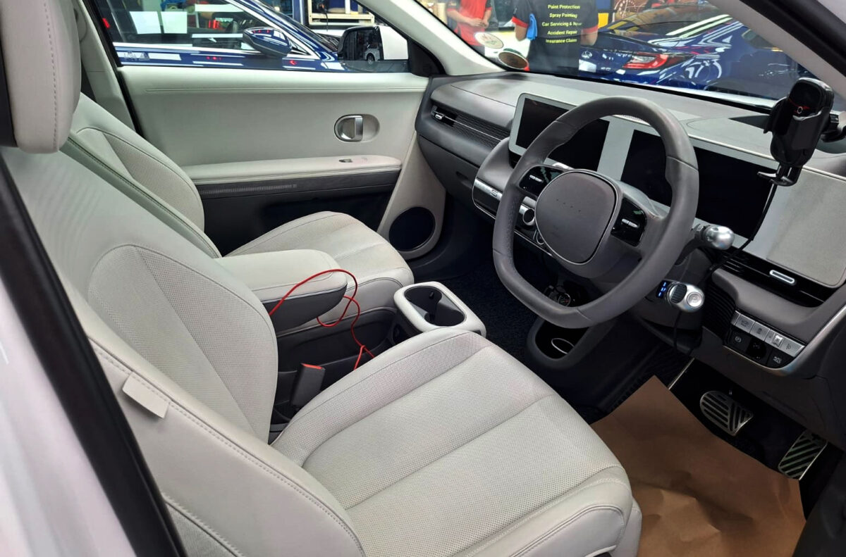 Reflections across the coated panels of the Hyundai Ioniq 5.