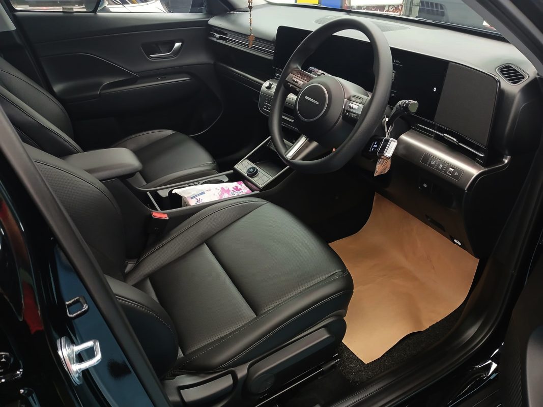 The Hyundai Kona parked in the workshop, freshly coated.