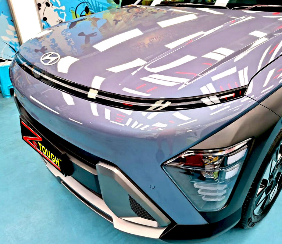 The Hyundai Kona's coated paintwork under workshop lighting.