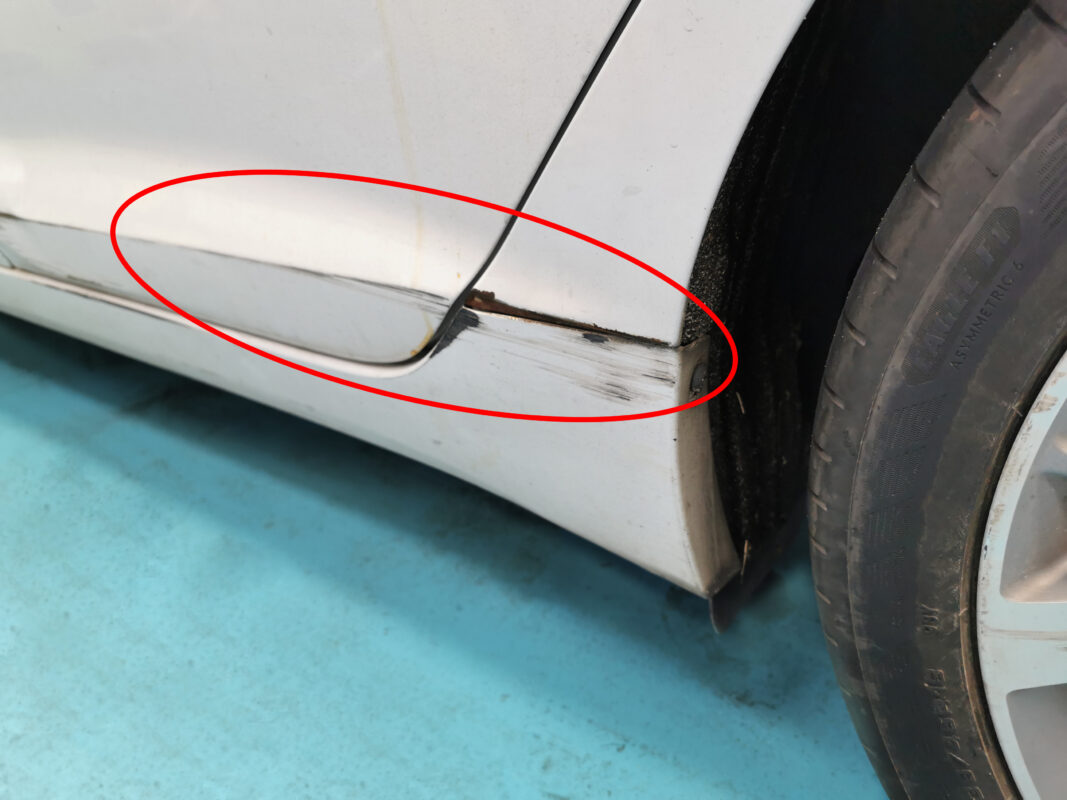 Close-up of the Sonata's faded and damaged paintwork on arrival.