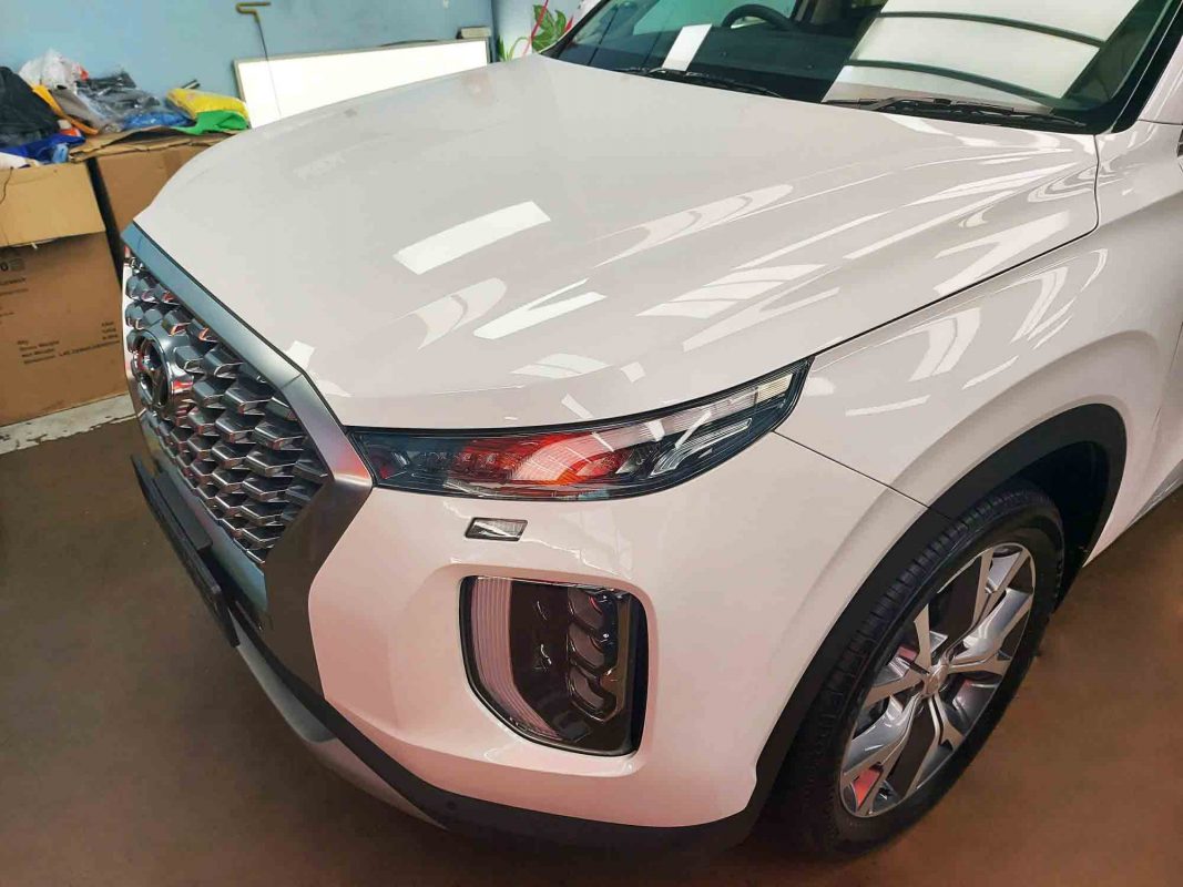 The Hyundai LX2 Palisade from a side angle after the ceramic coating.