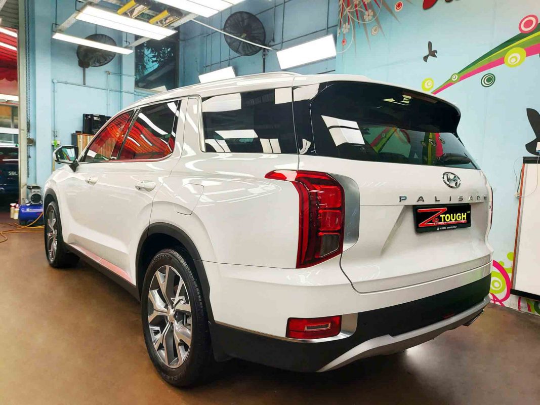Rear quarter of the Hyundai LX2 Palisade, glossy and protected.