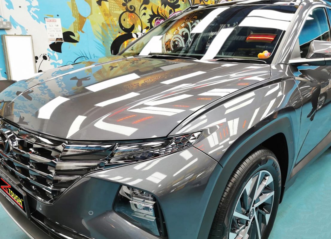 The Hyundai NX4 Tucson from a side angle after the ceramic coating.