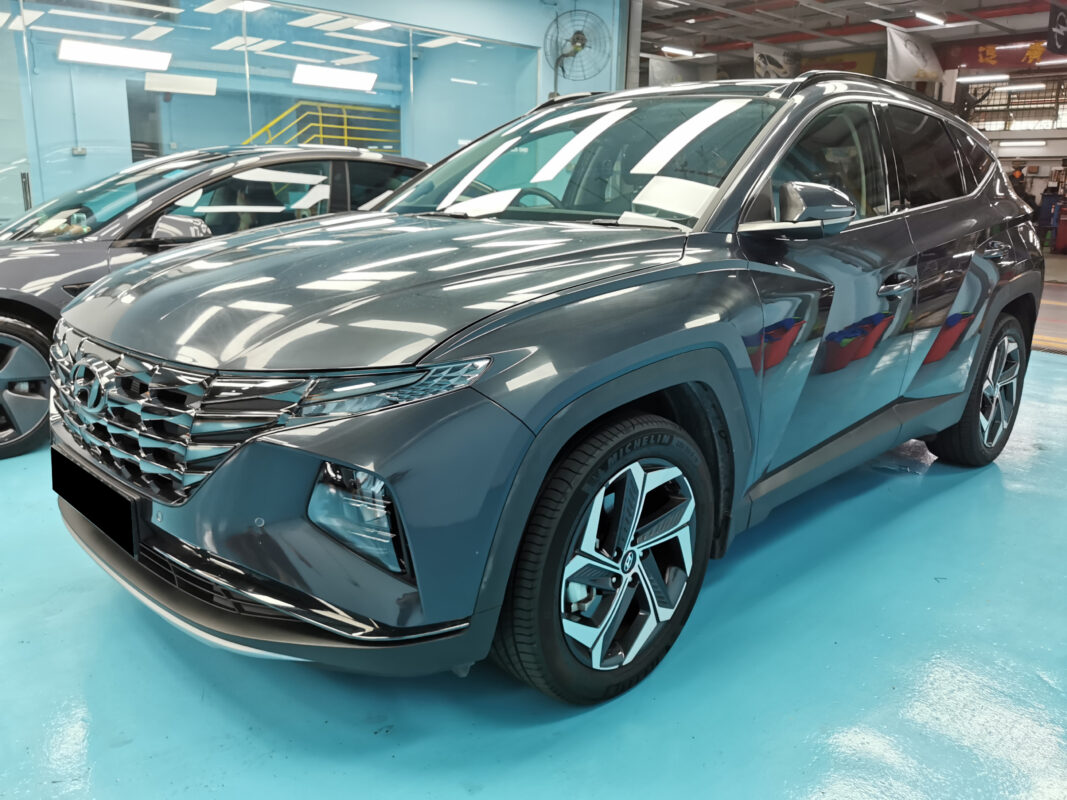 Hyundai Tucson front three-quarter view as it arrived at Revol Carz before the respray.