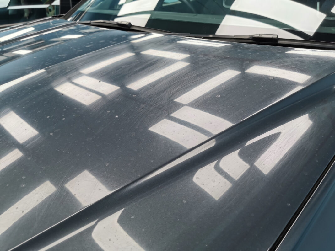 Hyundai Tucson side profile on arrival, paintwork dull and marked.