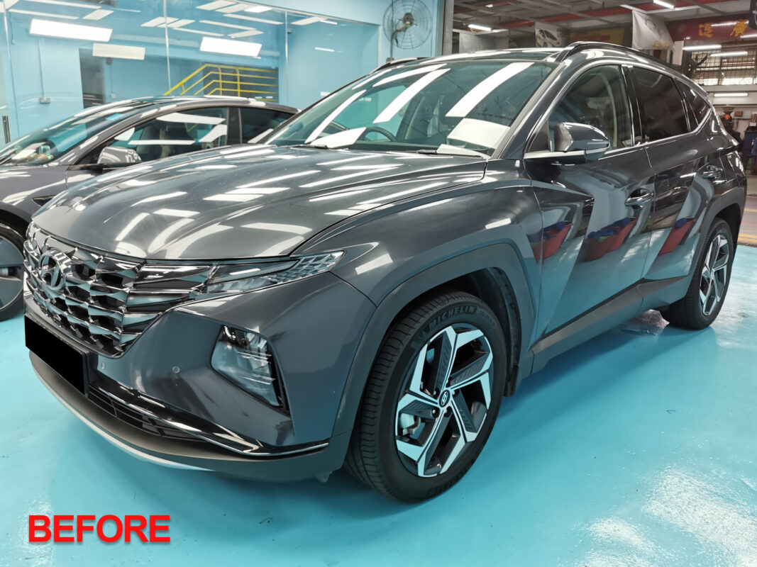 Hyundai Tucson reassembled after the respray, fresh panels gleaming.